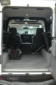 interior rear portion of the defender with the jump seats folded up